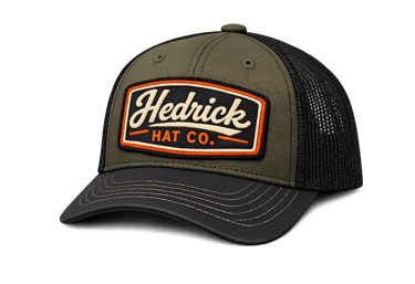 green trucker cap with Hedrick Hat Co patch