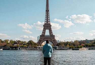 A warm, welcoming travel advisor smiling while planning a trip with a client.