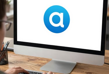 Close-up of hands working on a vibrant logo design on a computer screen.