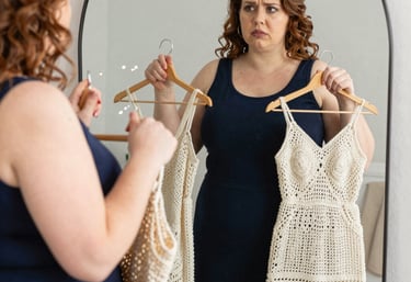 Elegant plus size woman smiling confidently wearing a premium knit dress.