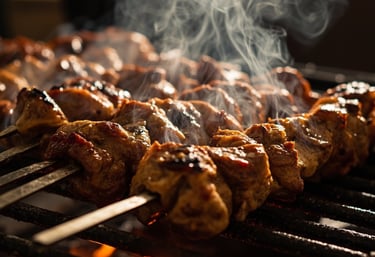 a grill with meat and vegetables on a grill