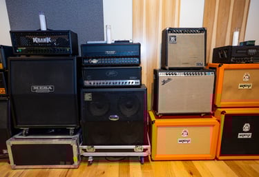 Guitar amps and cabinets at the recording studio.
