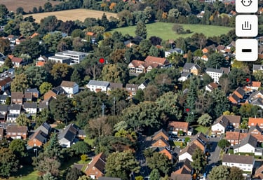 A clean, modern taxi parked on a quiet street in Epping at sunset.