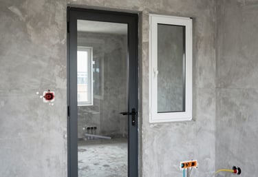 Technician fitting modern electrical wiring in a renovated kitchen.