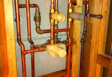 Copper plumbing pipes and shower valve installation