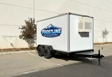 Frostline mobile refrigeration rental trailer parked in a lot for cold storage solutions.