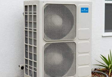 A sleek, modern home illuminated with teal and cyan glowing accents showcasing smart HVAC and solar technology integration.