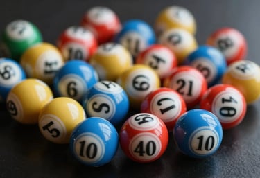 A collection of colorful lottery balls with visible numbers, scattered artistically on a dark reflective surface. The lighting highlights the textures in #F5B041 and #CBD5E0.