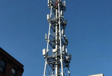 Illustration of mobile phones connected by voice waves symbolizing communication.