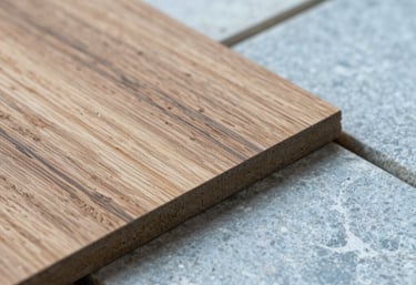 Macro photography of high-quality construction materials, focusing on wood textures and light blue-grey stone tiles, professional and clean aesthetic.