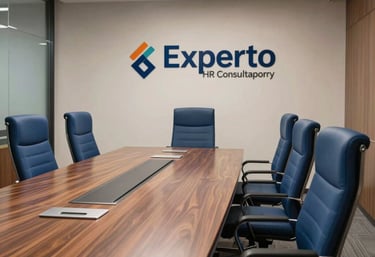 Corporate board room at Experto HR Consultancy, featuring a long polished walnut table and premium blue ergonomic executive chairs, professional corporate lighting, Ghaziabad office interior.