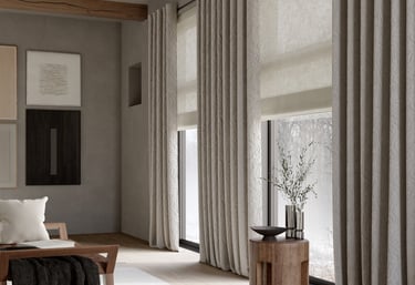Style and elegance are achieved with wave curtains and Roman blinds.