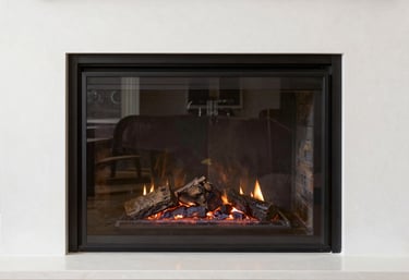 Photography of a spotless, recently cleaned hearth with a clear glass fire screen, reflecting a clean and modern North American home interior.