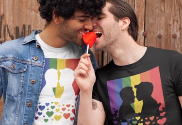 2 men sharing a lollipop wearing Flamingay T-shirts of a gay couple silhouette kissing