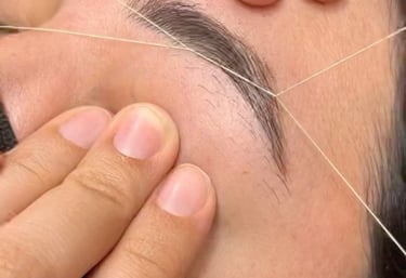Eyebrow threading service for precise shaping at ladies salon in Abu Dhabi