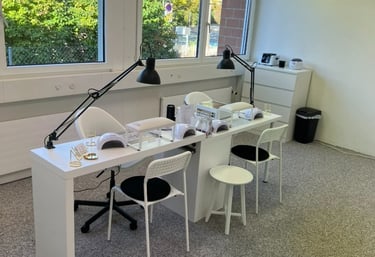 a desk with a lamp and a desk with a lamp