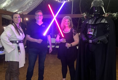couple with light sabers