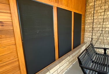 Screen Over Windows with a lawn chair