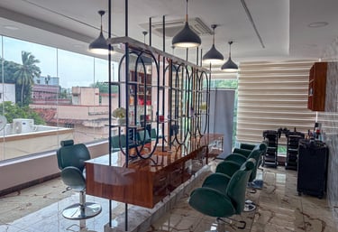 Cozy salon interior with comfortable chairs and soft lighting, showing a client receiving a facial treatment.