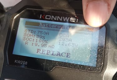 Mechanic doing scan on vehicle