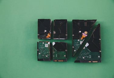 A hard drive cut into many parts