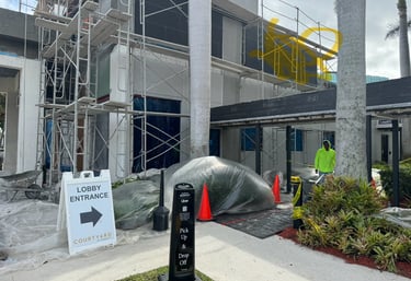 remodeling exterior of the hotel framing stucco and painting