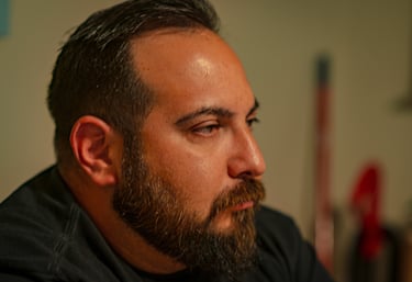 Side profile of a middle-aged man with a groomed brown beard and short dark hair. Athens, Oh