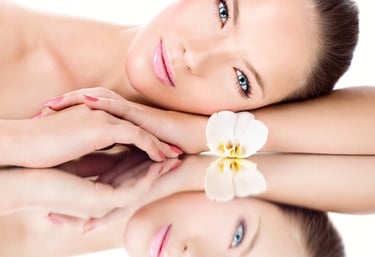 woman with orchid and mirror refelection