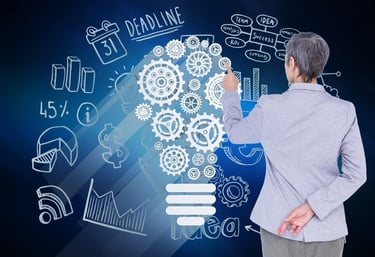 Personne observant des graphiques et des engrenages symbolisant le développement des compétences.