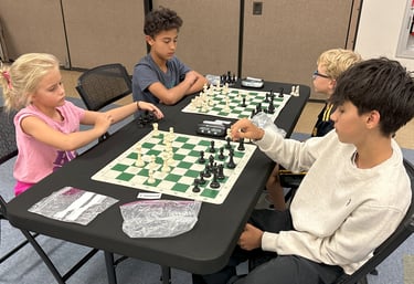 Children playing chess at a practice chess tournament at the Henderson Multi-Gen Rec Center in NV