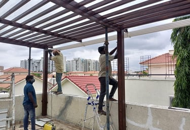 Outdoor pergola structure designed and fabricated for villas and apartments in Bangalore