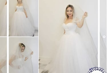 A happy bride with her dress