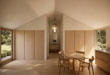 Minimalist modern dining area with a wood table, chairs, vaulted ceiling, and natural sunlight.
