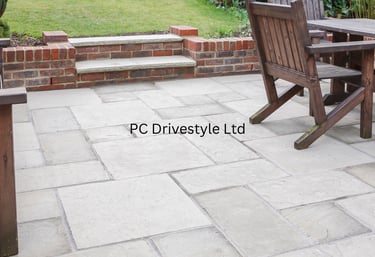 white stone patio in garden by PC Drivestyle Ltd