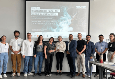 Françoise Gaill, Lucas Becquet and other experts are standing in front of a presentation