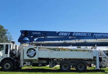 Croft Concrete boom truck in yard preparing for another pump job.