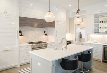 a kitchen with a large island and a large island