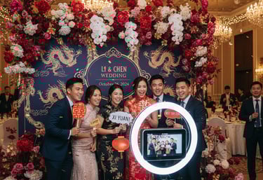 a group of people standing around a large mirror