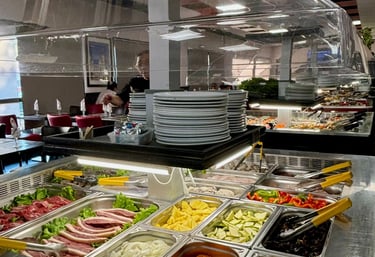 a buffet with a variety of different types of food