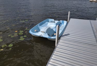 paddleboat at dock lakeside lake views southern michigan vrbo airbnb dock short term rental