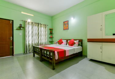 A family enjoying the amenities at Karapuzha Resorts, with children playing in a secure playground a
