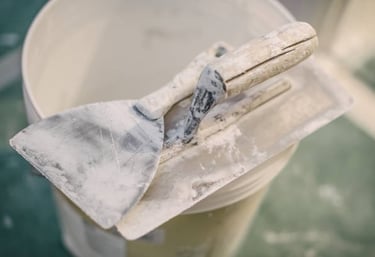 drywall tools on a bucket