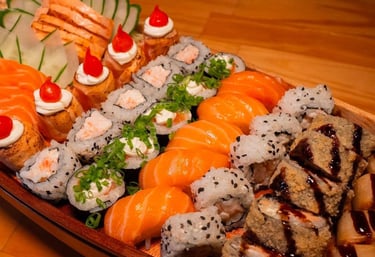 a long boat shaped plate with sushi and sushi