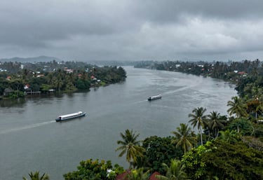 A densely packed array of colorful tents spans across a large outdoor area, suggesting a crowded campsite setting with various makeshift shelters. In the background, a few buses and vehicles are parked, indicating temporary accommodations and transport options.