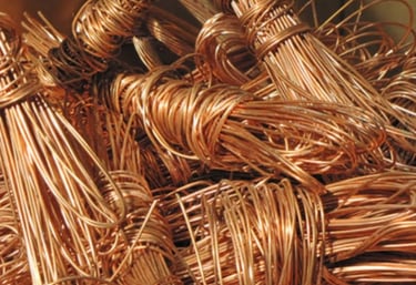a pile of copper wire wrapped in copper foil