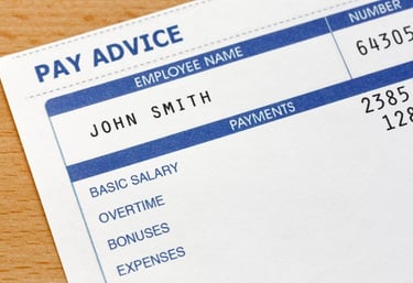 Employee pay stub and payroll documents showing payroll processing and payment calculations