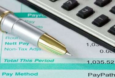 Invoices and payment records with calculator representing accounts payable and receivable management