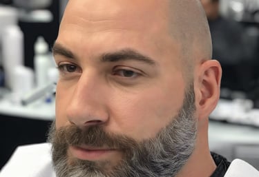 A close-up of a person's face focusing on the eye area, showcasing a perfectly shaped eyebrow and eye makeup with sleek black eyeliner and neutral eyeshadow.