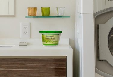 deodorizer tub on a benchtop in a laundry 