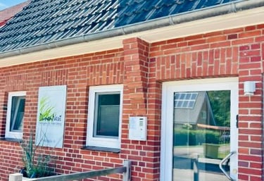 Hotel DunenNest - Ansicht vom Eingang und Schlüsselkasten, links neben der Tür